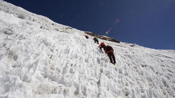 Mandatory Credit: Photo by Christian Kober/Robert Hardi/REX Shutterstock (1267899a) Climbers on an ice wall, Island Peak 6189m, Solu Khumbu Everest Region, Sagarmatha National Park, Himalayas, Nepal, Asia Nepal VARIOUS